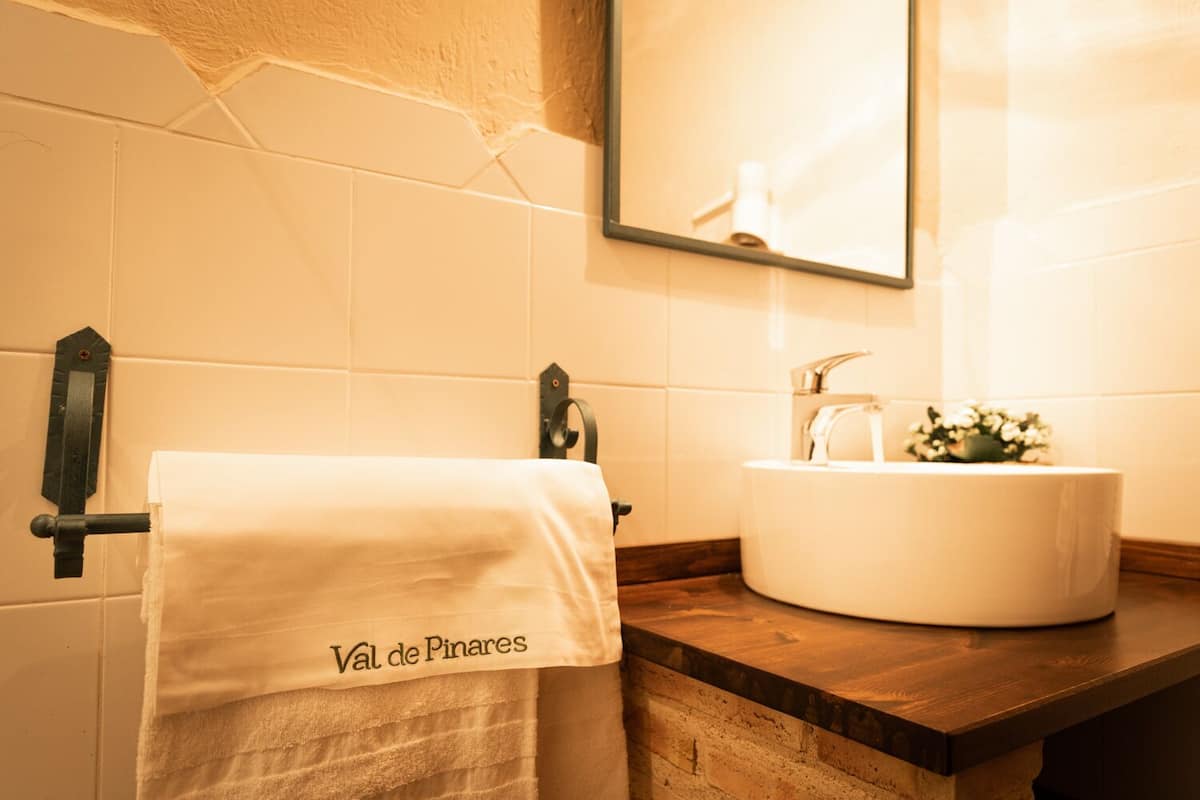 family room | bathroom | designer toiletries, hair dryer, towels