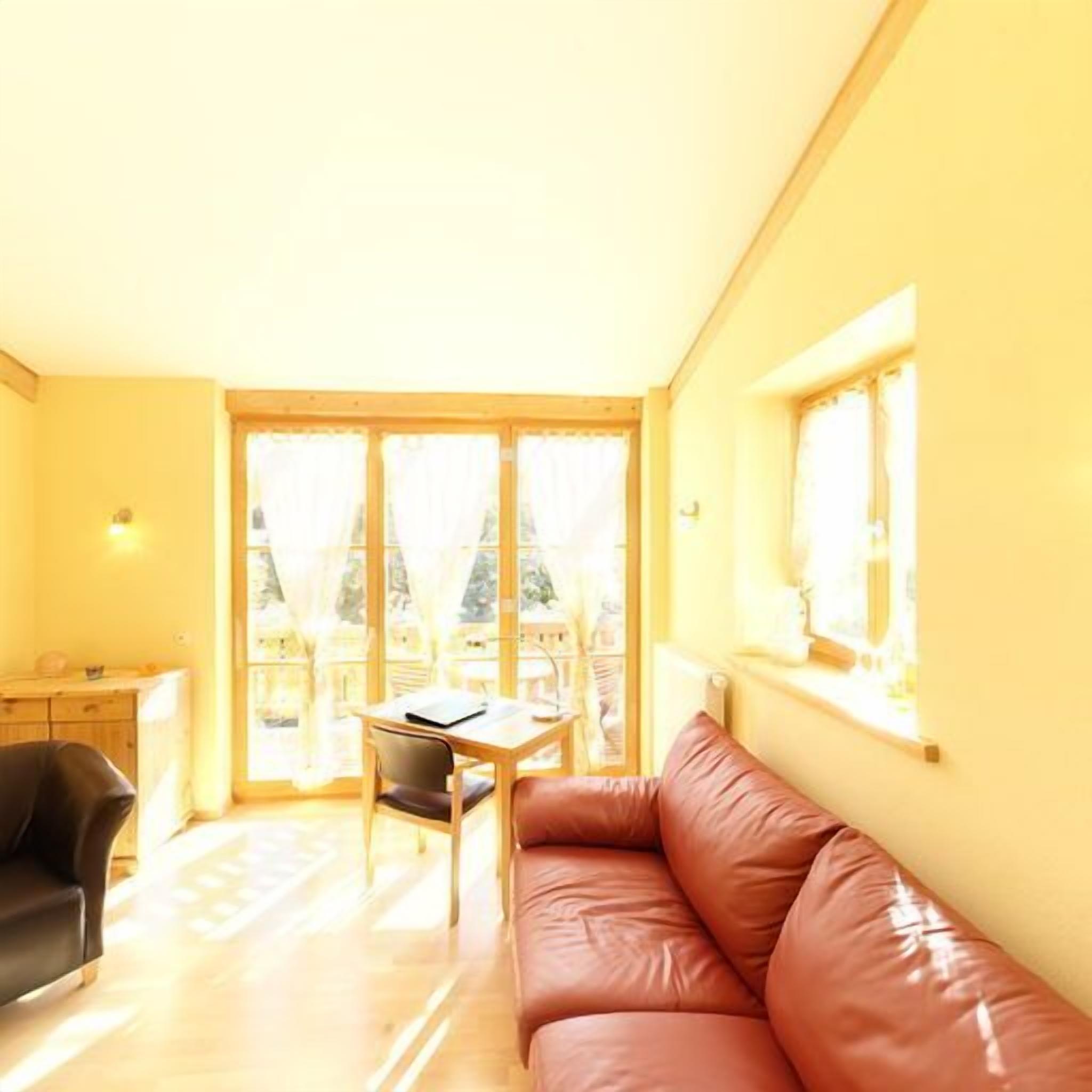 junior suite | living area | flat-screen tv