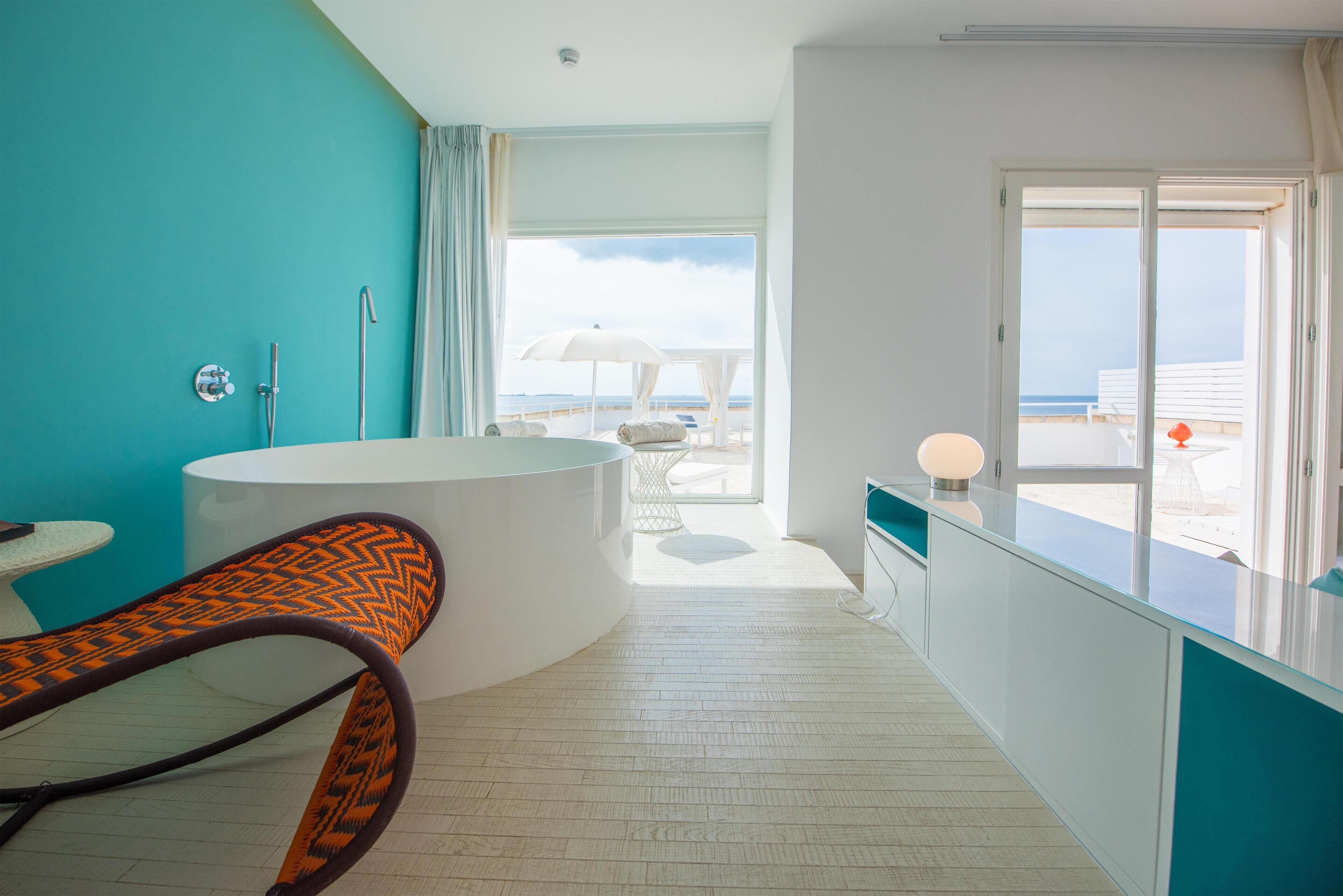 Deluxe Triple Room, Terrace, Sea View | Premium bedding, minibar, in-room safe, desk