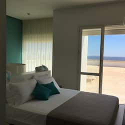 Deluxe Triple Room, Terrace, Sea View | 1 bedroom, premium bedding, minibar, in-room safe