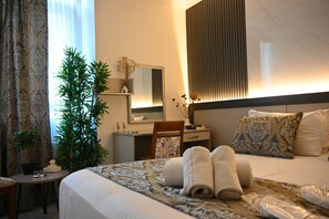 Premium bedding, minibar, desk, soundproofing