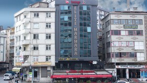 A multi-story building with a prominent 'ELITE MARA' sign on the facade. - Elite Marmara Hotel Gungoren (Istanbul)