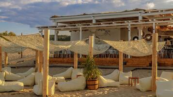 Private beach, white sand, sun-loungers, beach umbrellas