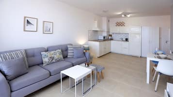 Superior Apartment | Living area | TV