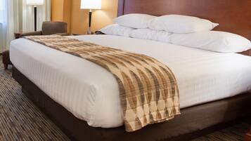 Desk, blackout drapes, iron/ironing board, free cribs/infant beds