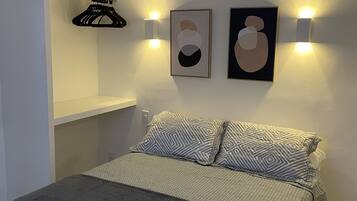 Standard Double Room, 1 Bedroom | Minibar, individually decorated, desk, blackout drapes