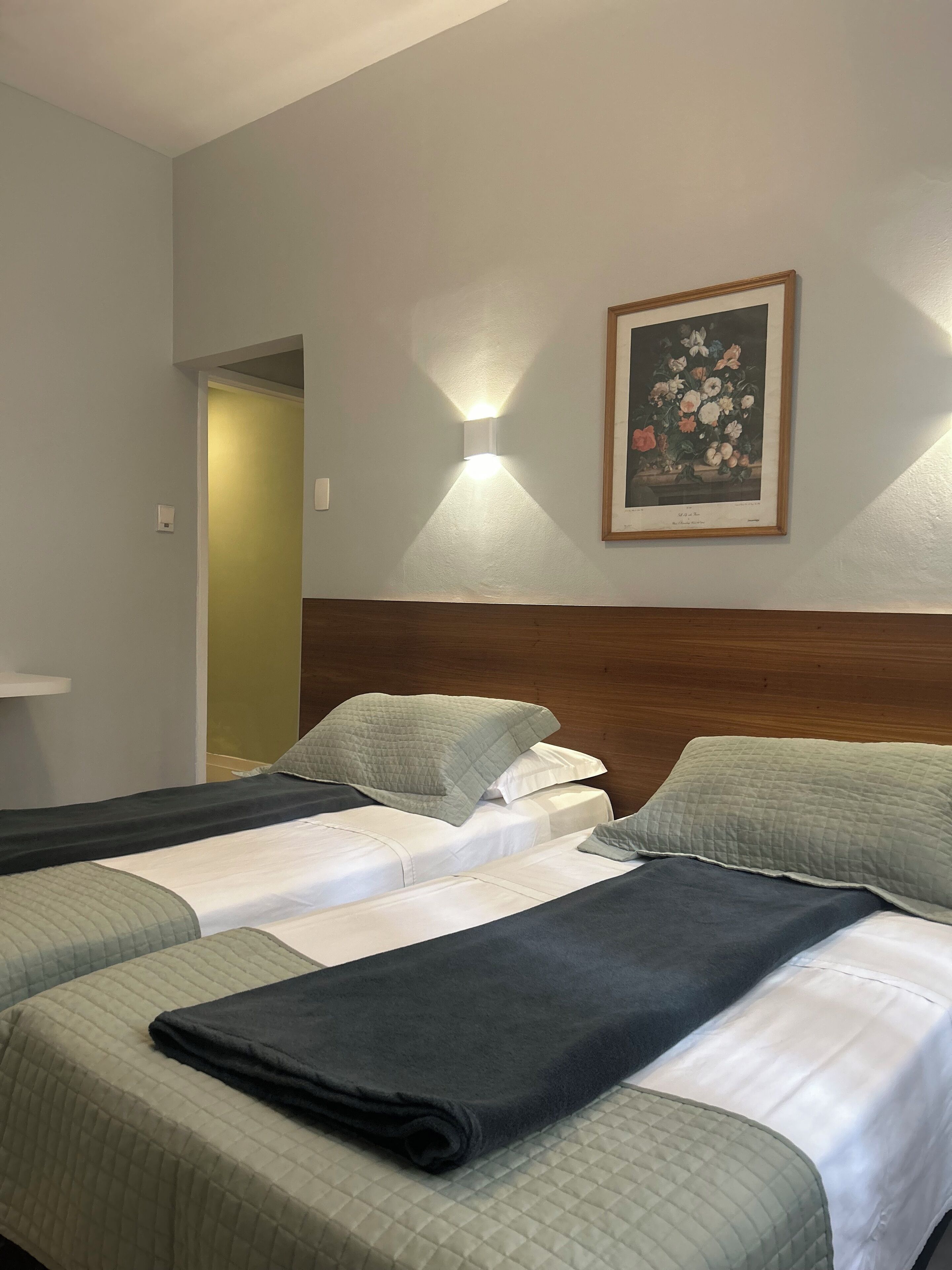 standard twin room, 2 single beds | minibar, individually decorated, desk, blackout curtains