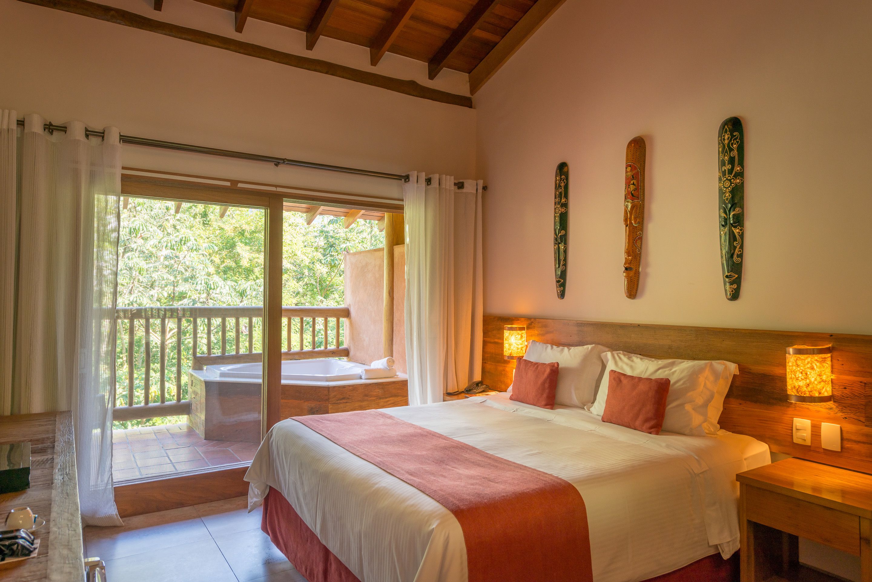 Double Room, Jetted Tub | Minibar, in-room safe, individually decorated, desk