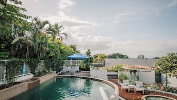 Outdoor pool, open 7:00 AM to 9:30 PM, free cabanas, pool umbrellas