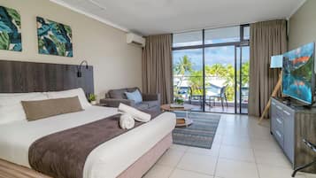 Premium bedding, blackout curtains, soundproofing, iron/ironing board