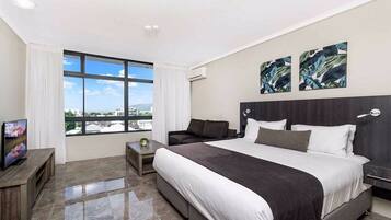 Premium bedding, blackout curtains, soundproofing, iron/ironing board