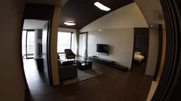 Suite, 2 Bedrooms | Living room | Flat-screen TV