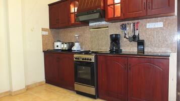 Family Villa, 5 Bedrooms | Private kitchen | Fridge, microwave, oven, coffee/tea maker