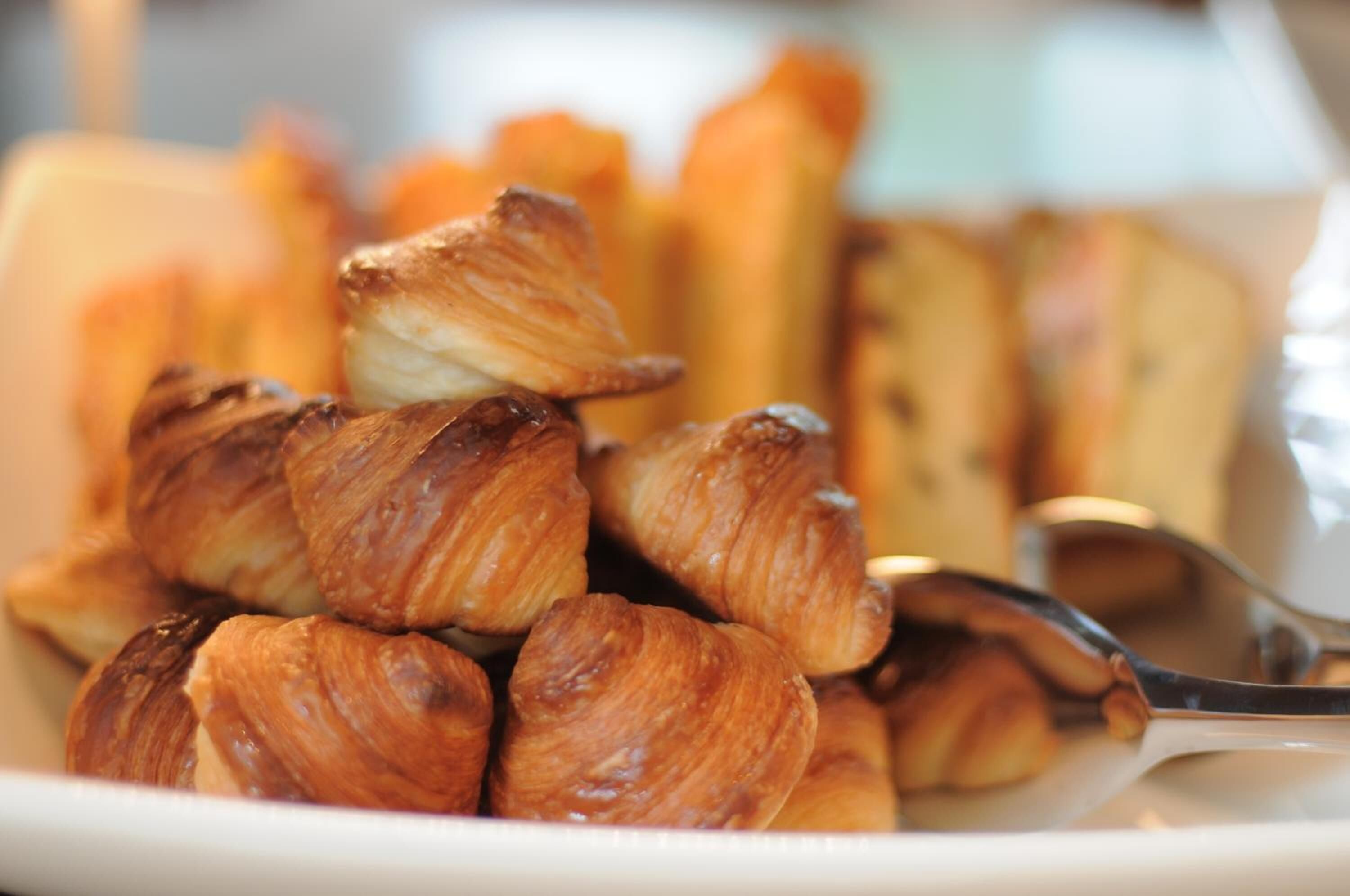 A bowl of croissants.