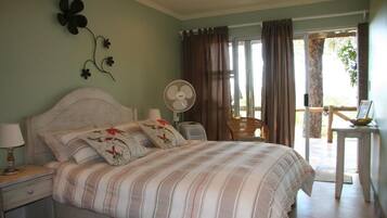 Roupas de cama premium, frigobar, Wi-Fi