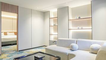 Luxury Suite, 1 King Bed | Living area | Flat-screen TV
