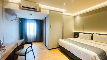 Desk, laptop workspace, free WiFi, bed sheets