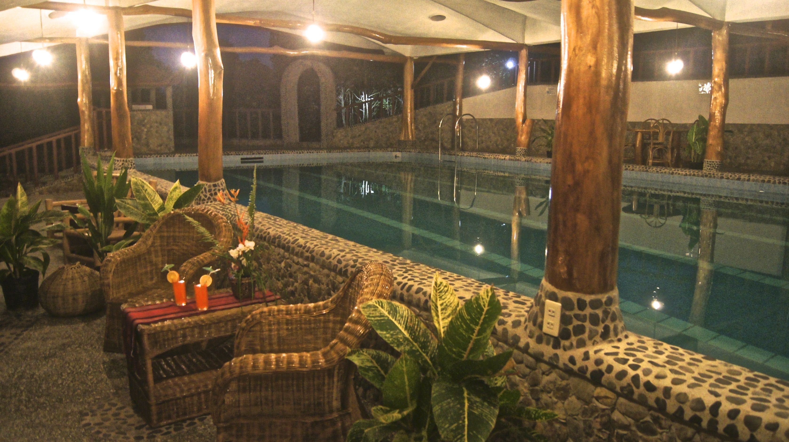 outdoor pool, open 7:00 am to 7:00 pm, pool loungers