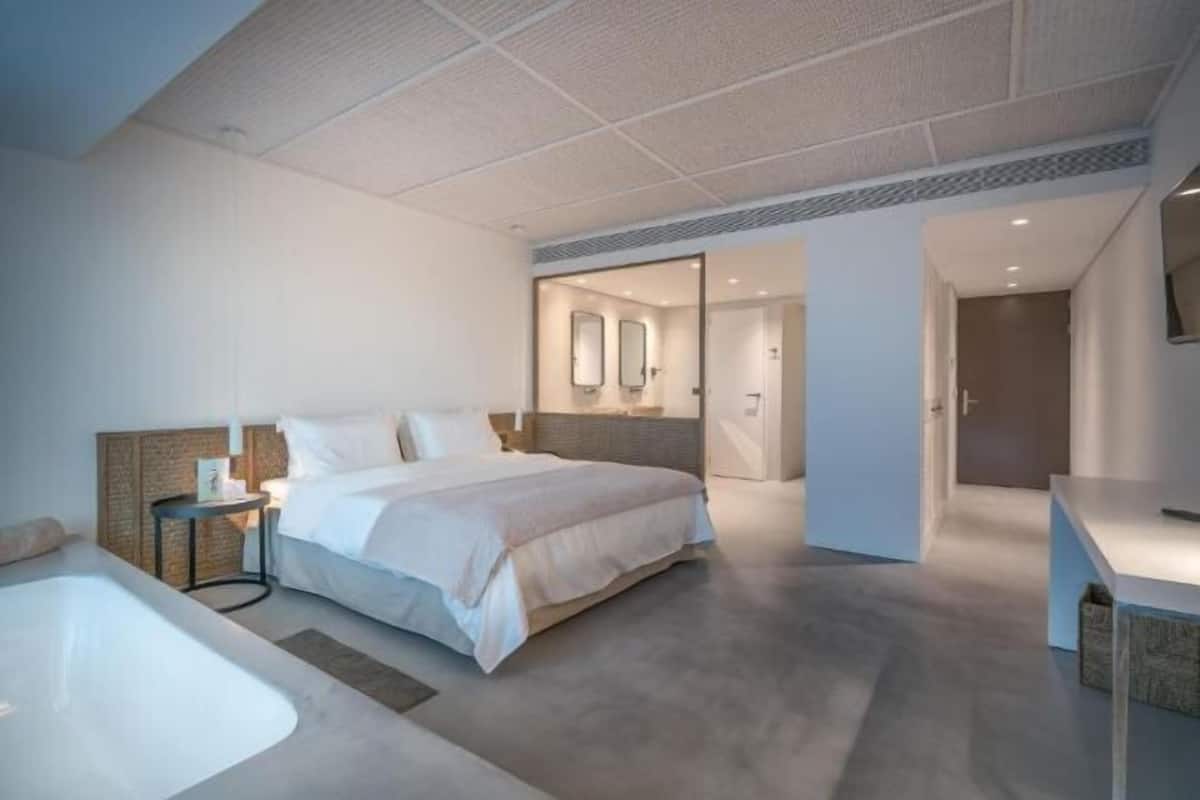 Minibar, coffres-forts dans les chambres, rideaux occultants