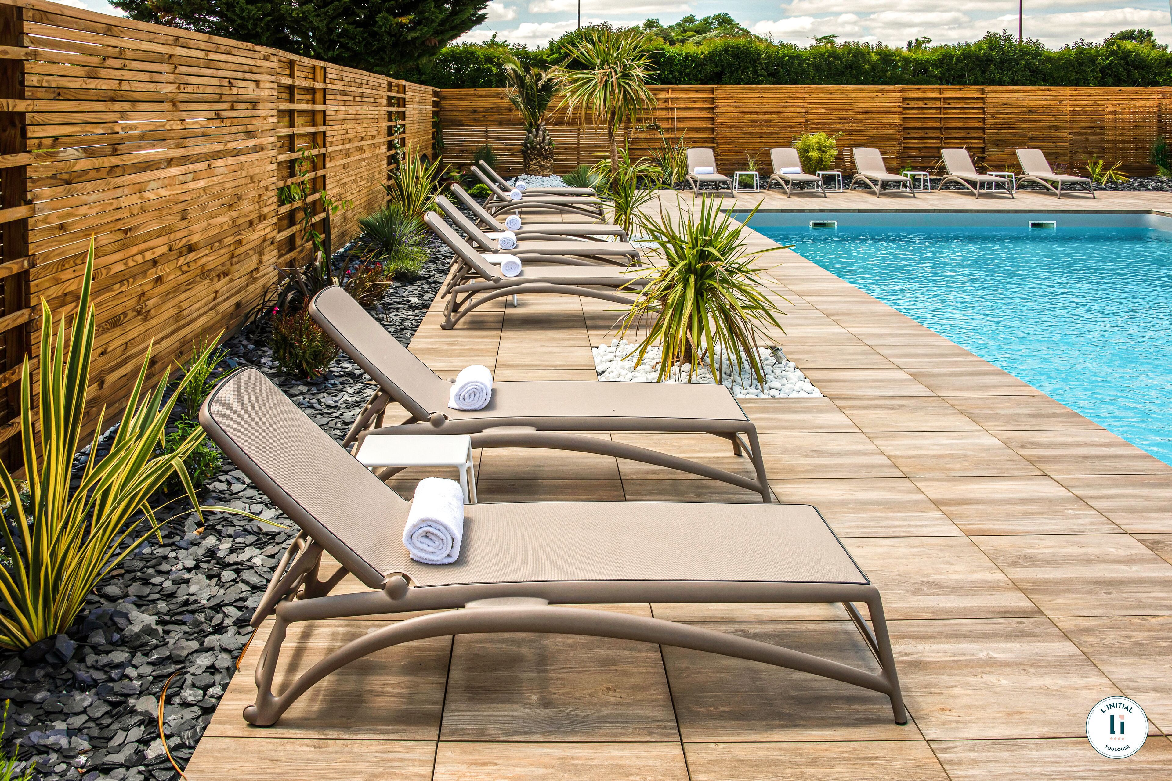 seasonal outdoor pool, open 9:00 am to 9:00 pm, pool loungers