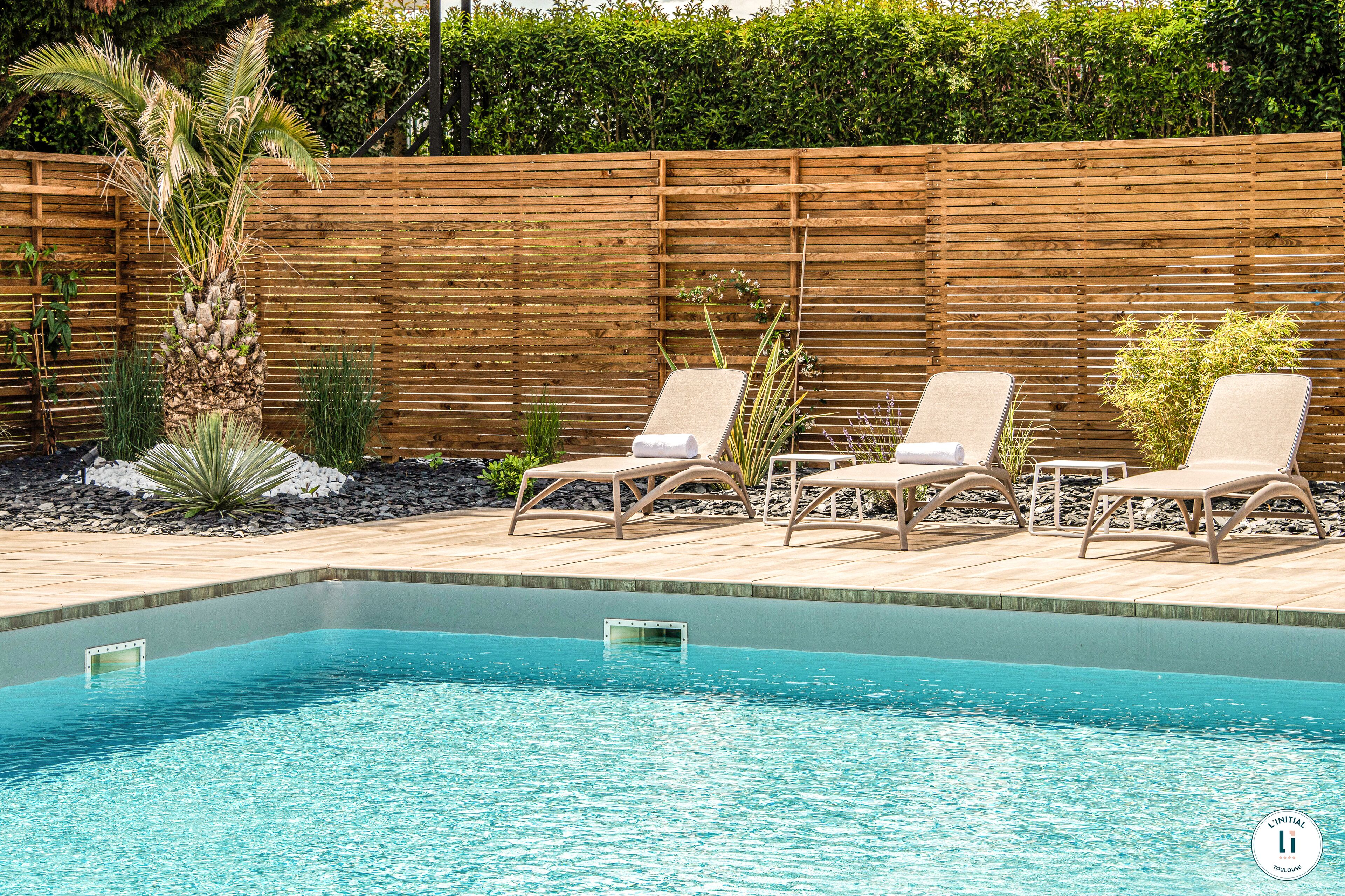 seasonal outdoor pool, open 9:00 am to 9:00 pm, pool loungers