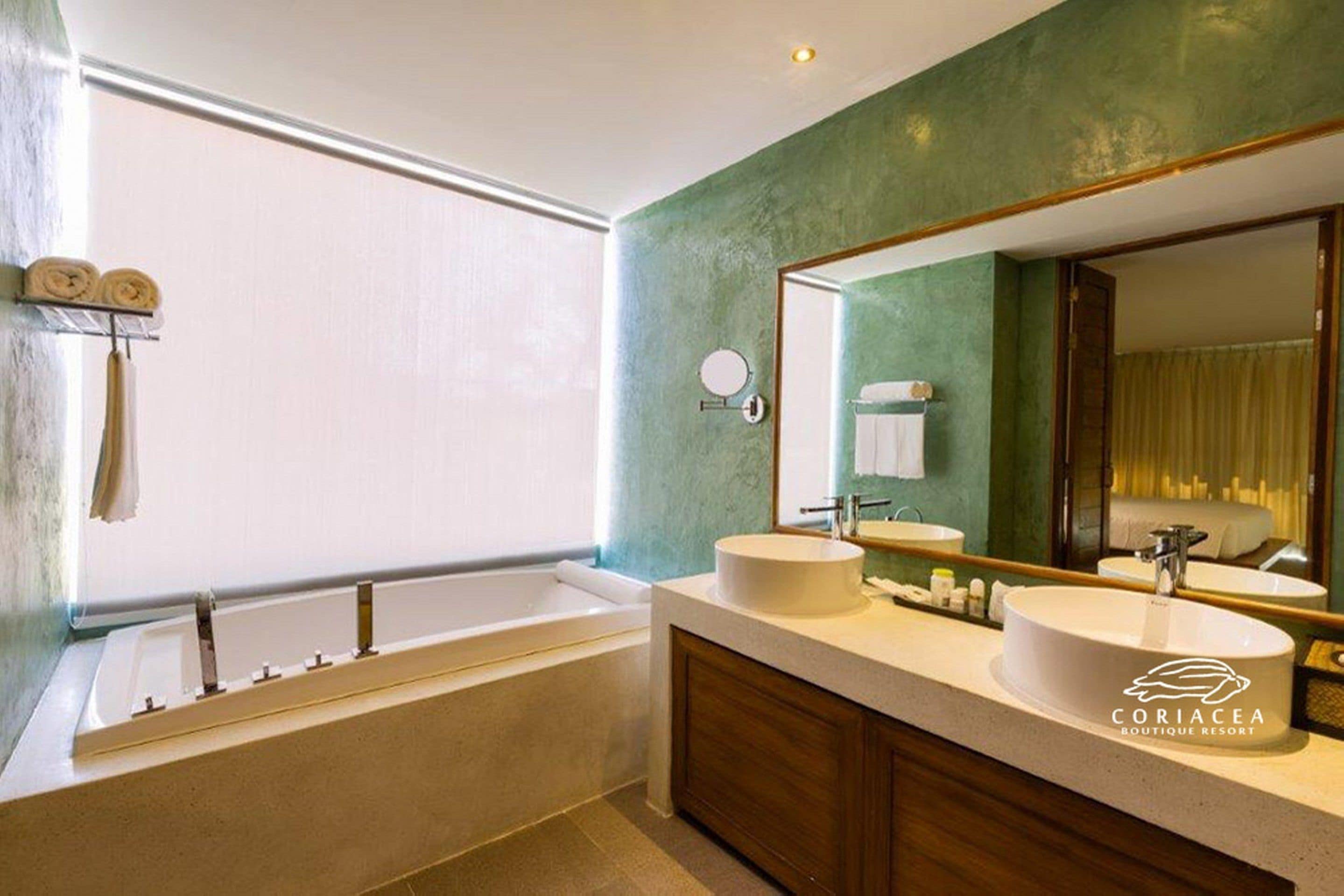 beach front suite | bathroom | shower, free toiletries, hair dryer, slippers