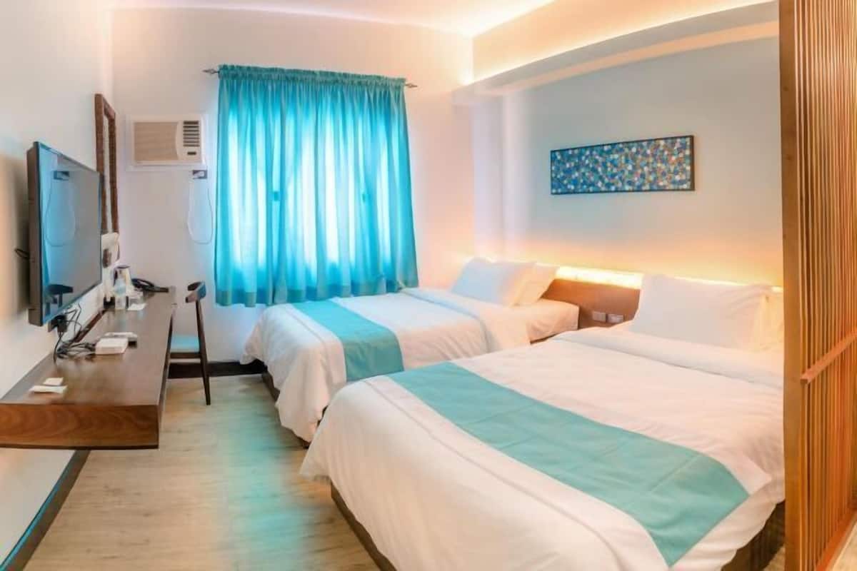 Luxe beddengoed, een kluis op de kamer, een bureau, gratis wifi