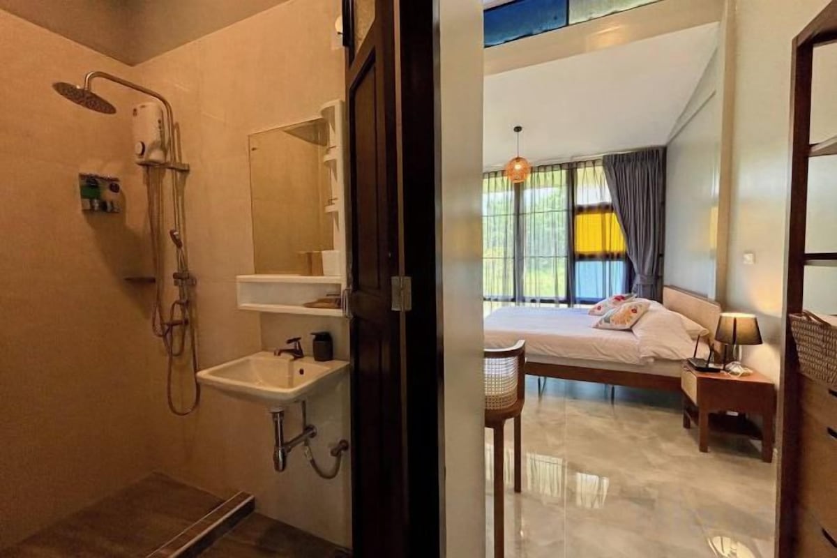 Bathroom | Shower, free toiletries, hair dryer, slippers