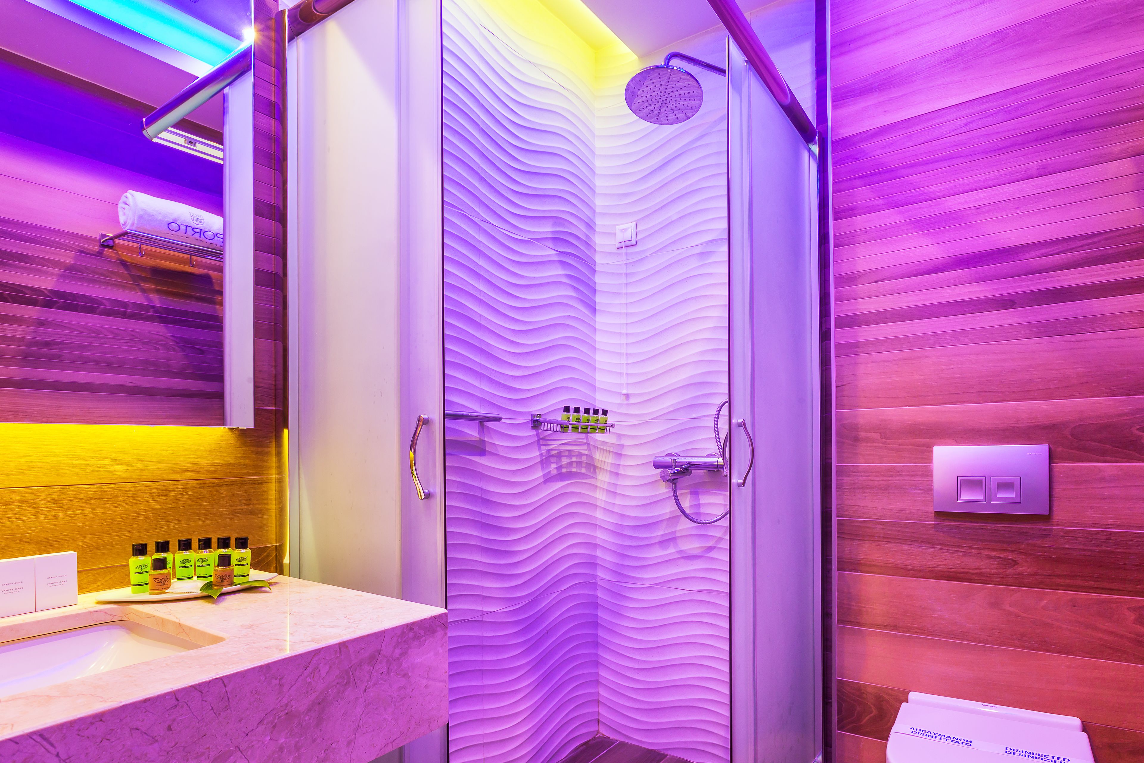 combined shower/bathtub, designer toiletries, hair dryer, bathrobes