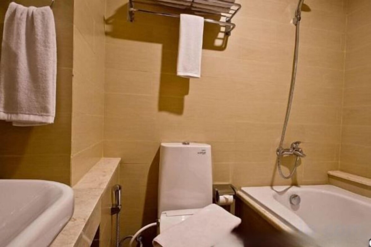 Bathroom | Shower, free toiletries, hair dryer, bathrobes
