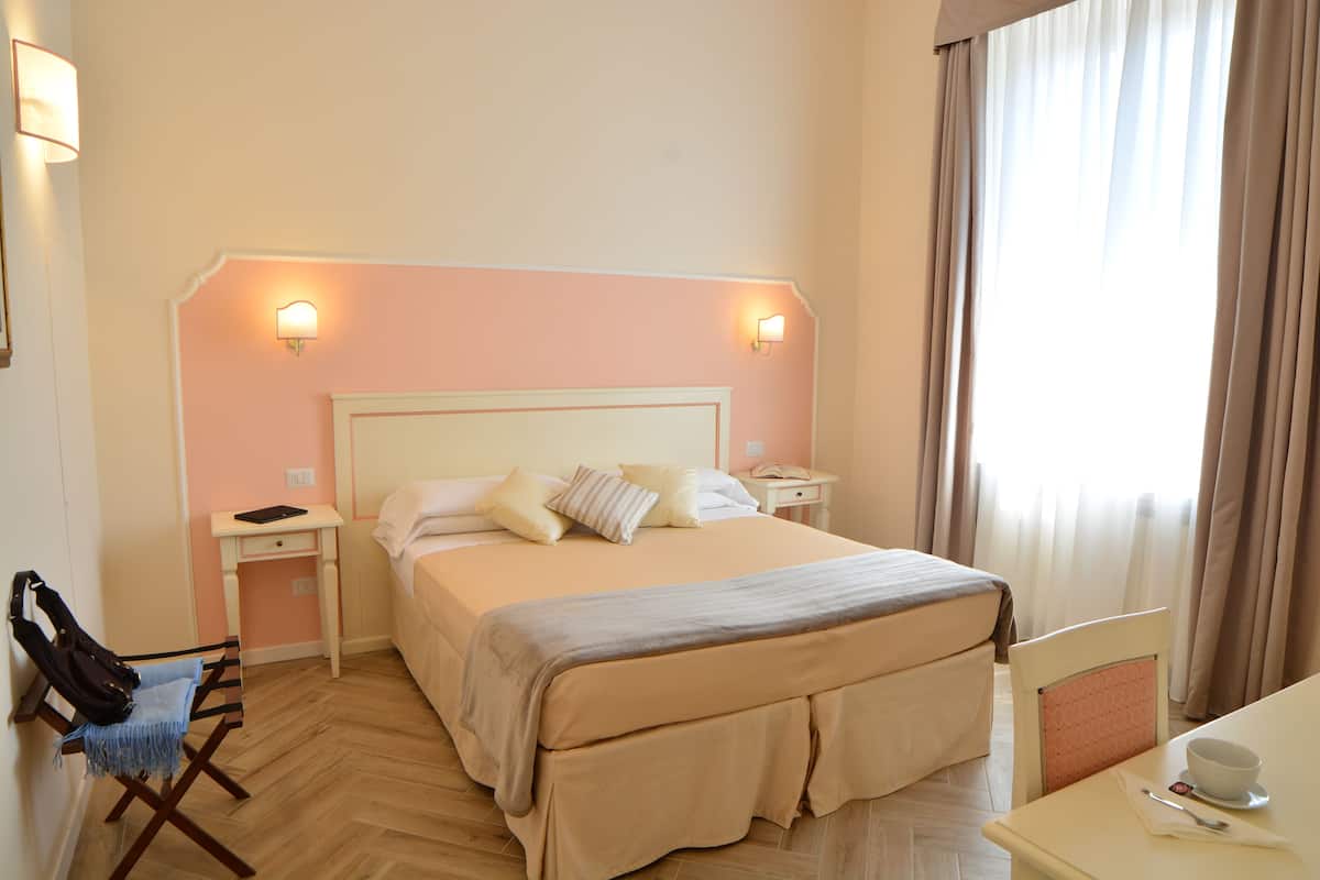 In-room safe, desk, blackout curtains, iron/ironing board
