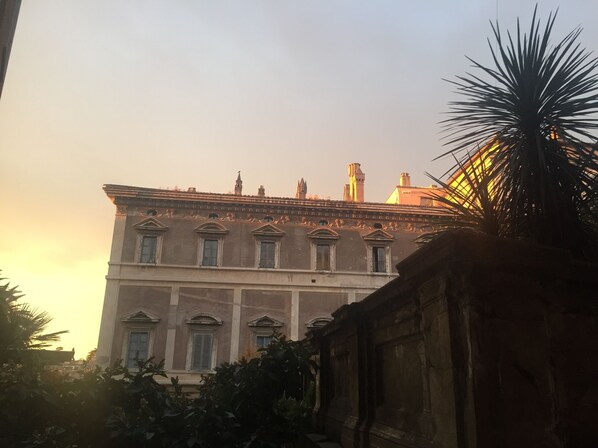 A historic building with classical architecture, featuring a symmetrical facade with evenly spaced windows and decorative moldings. - A Star Inn (Rome)