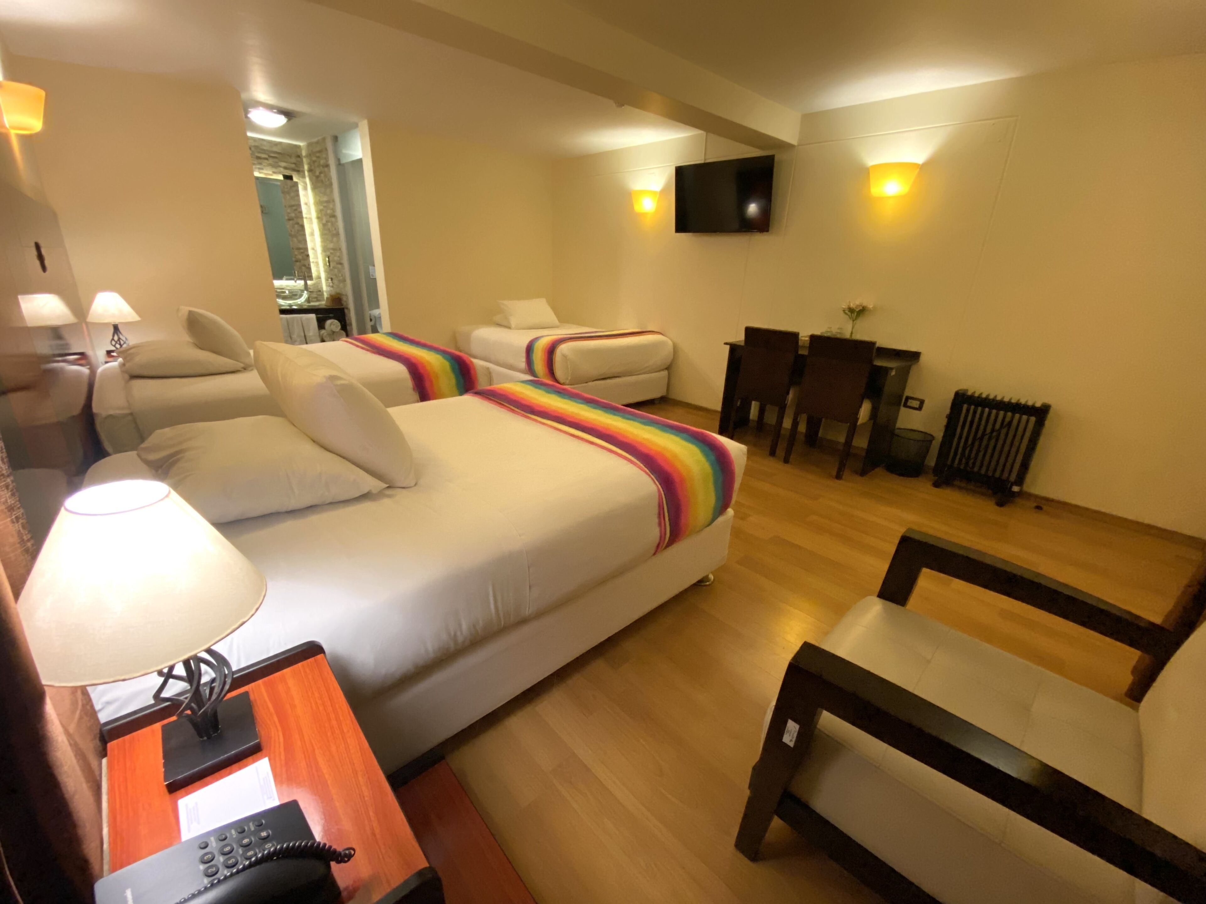 superior triple room, multiple beds | premium bedding, in-room safe, desk, free wifi