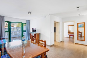 Club Apartment, 1 Bedroom | Living area | 24-inch flat-screen TV with satellite channels, LED TV