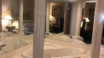 Suite, 1 King Bed, Non Smoking, Jetted Tub | 1 bedroom, individually decorated, individually furnished