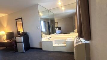 Room, 2 Queen Beds, Non Smoking, Jetted Tub | Iron/ironing board, free WiFi, bed sheets