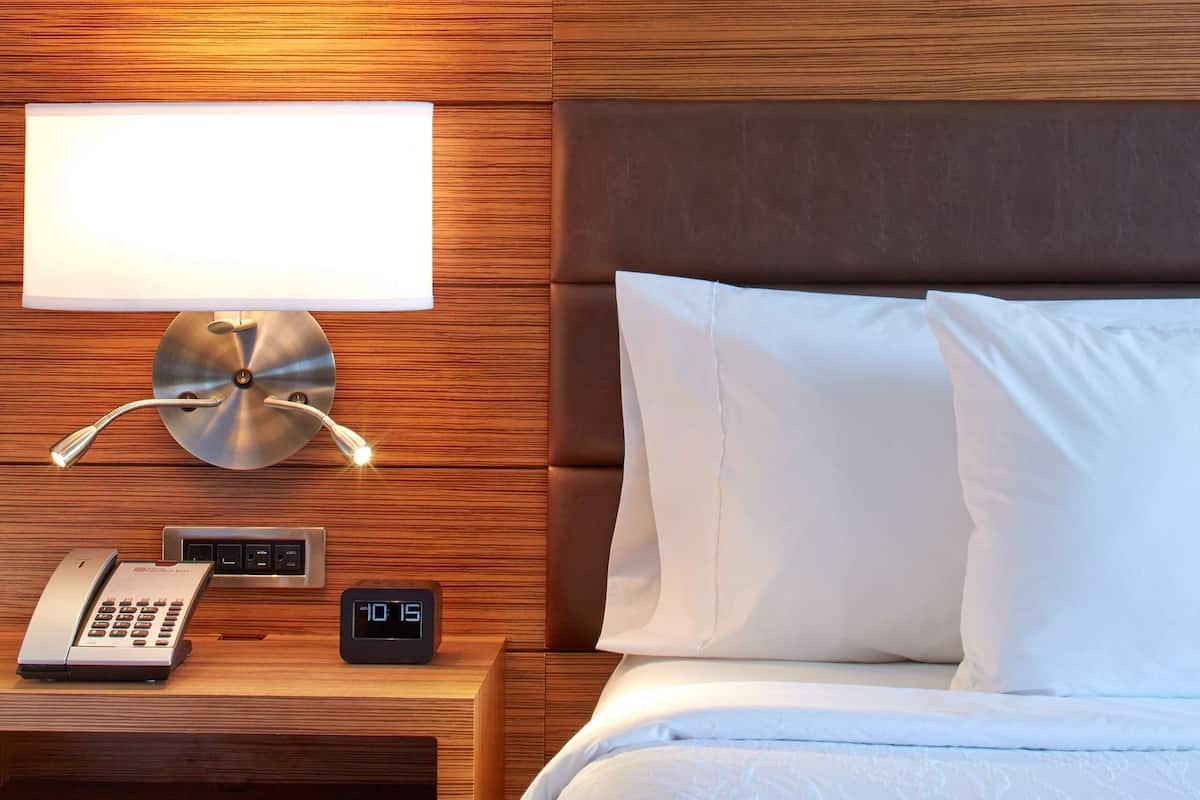 desk, laptop workspace, blackout curtains, iron/ironing board