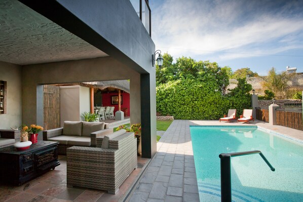 Outdoor pool, pool umbrellas, pool loungers