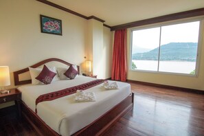 Deluxe Double Room, 1 Bedroom, Refrigerator, River View | Minibar, in-room safe, desk, bed sheets - Arawan Riverside Hotel (Pakse)