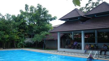 Outdoor pool, open 7:00 AM to 8:00 PM, pool umbrellas, pool loungers