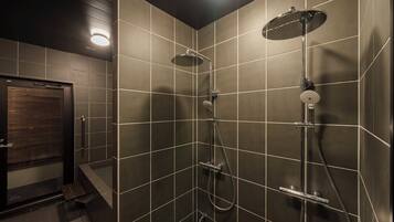 Shower, hair dryer, slippers, towels