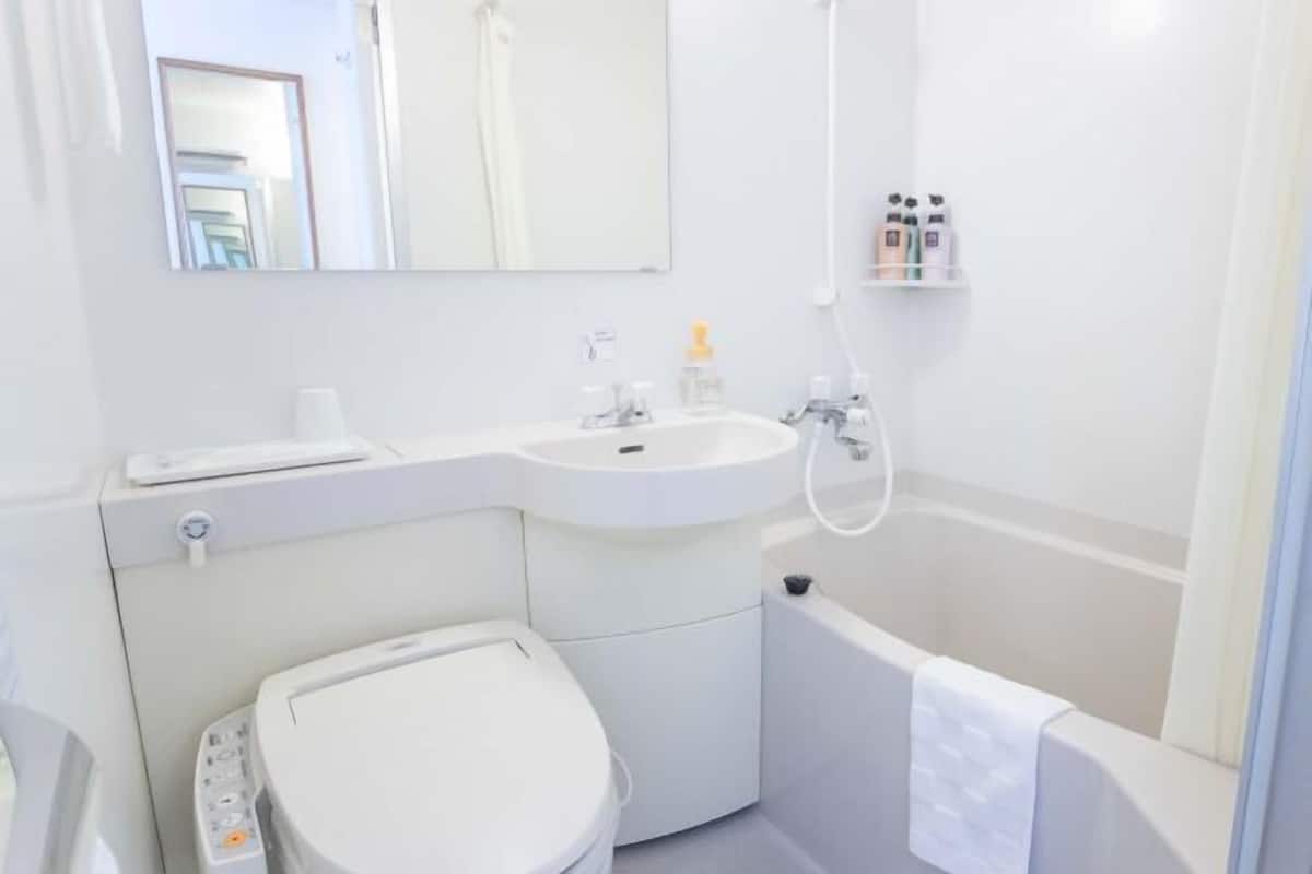 Ensemble douche/baignoire, baignoire relaxante profonde, sèche-cheveux