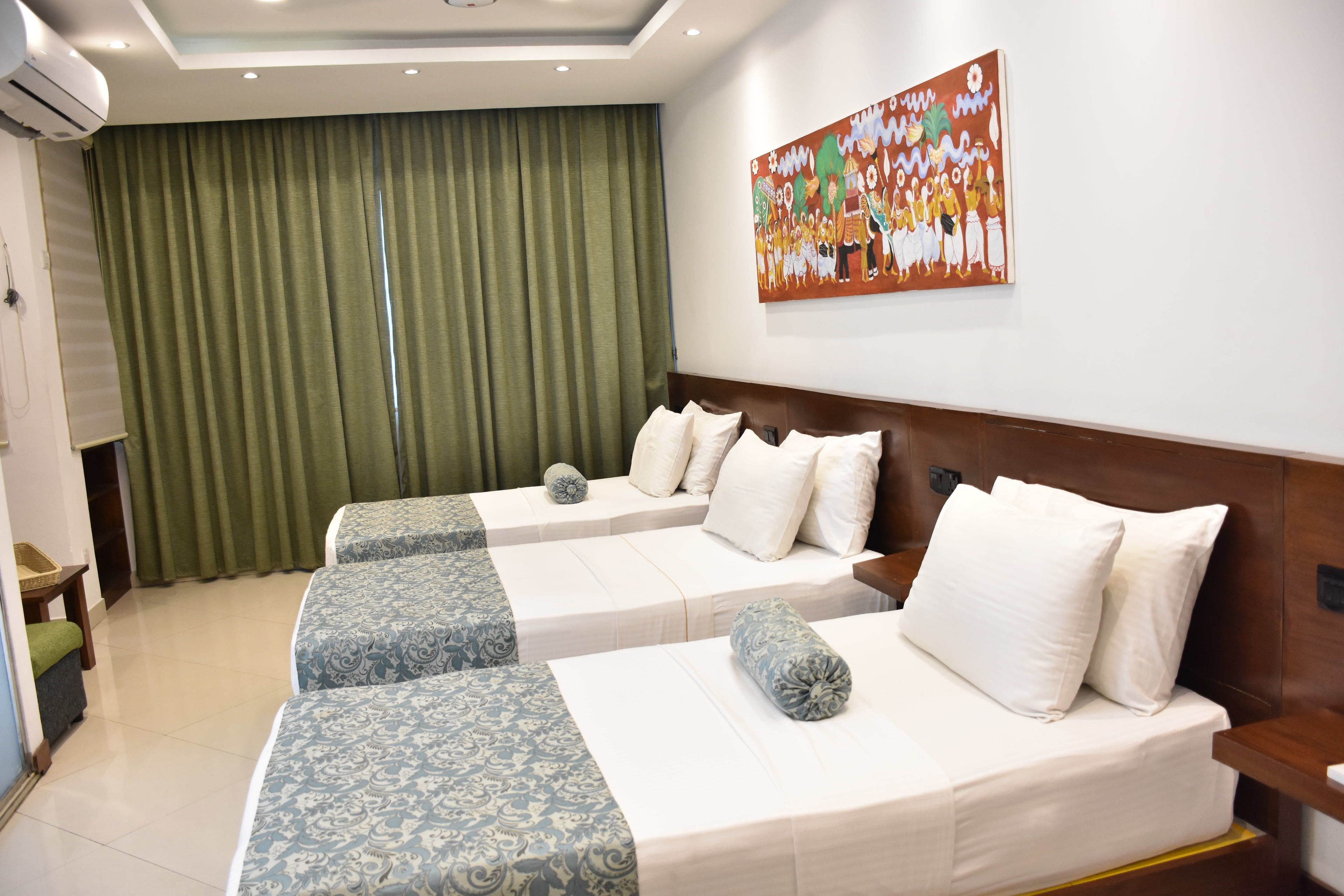 Deluxe-Zweibettzimmer | Minibar, individuell eingerichtet, kostenloses WLAN, Bettwäsche