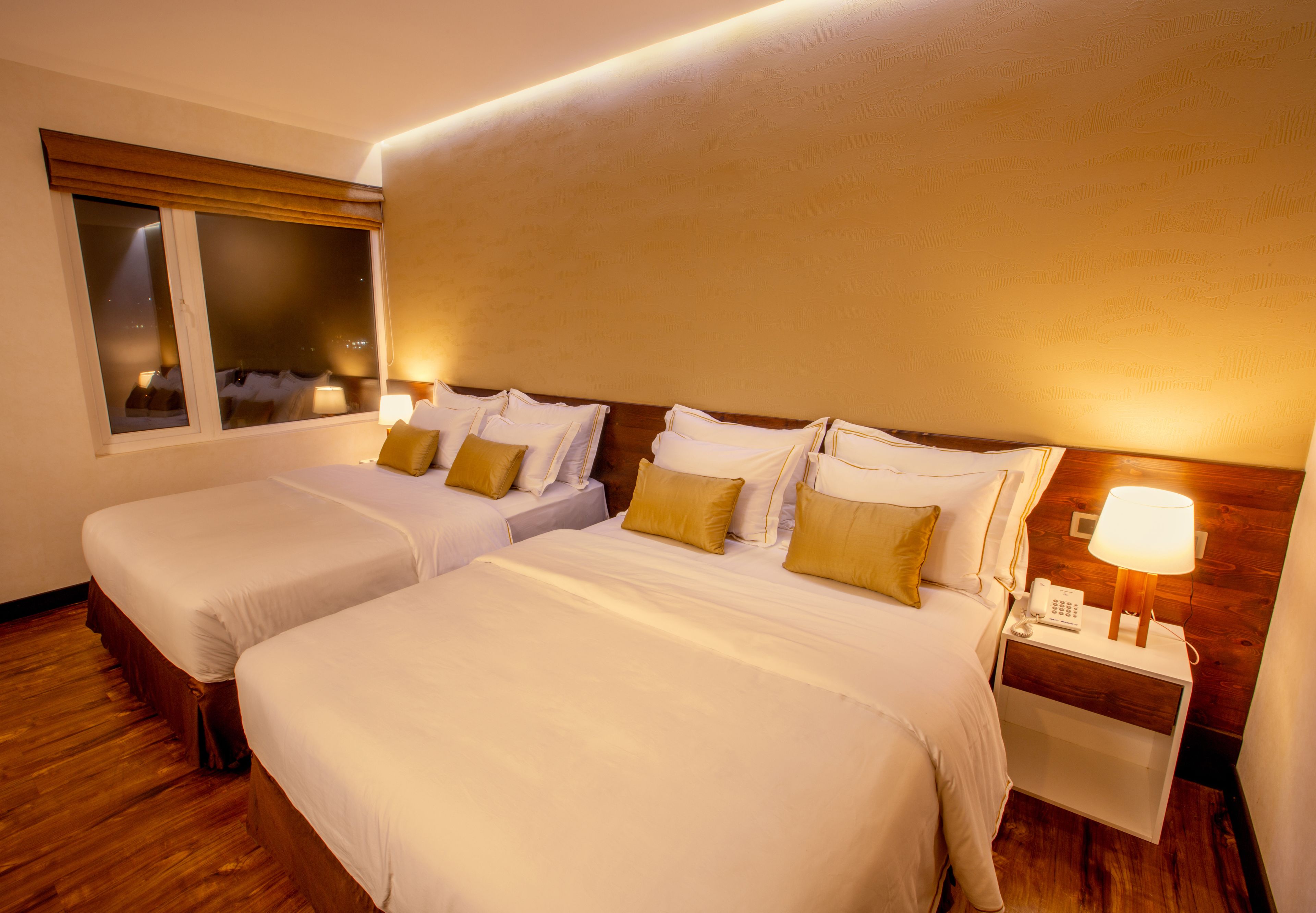 deluxe twin (city view) | desk, blackout curtains, soundproofing, iron/ironing board