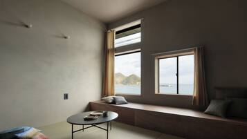 Double Room, Ocean View | Individually decorated, blackout curtains, free WiFi, bed sheets