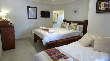 Premium bedding, down duvets, pillow-top beds, blackout curtains