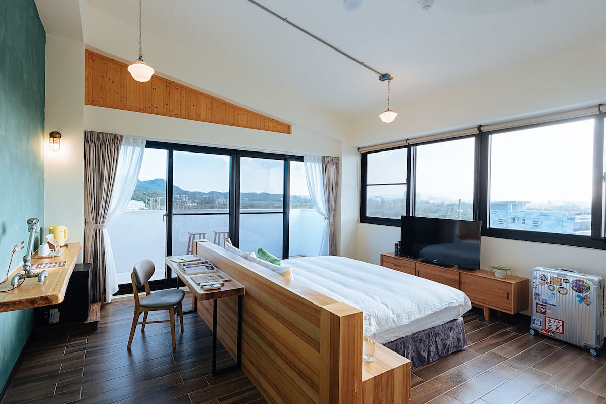 Deluxe Room, 1 King Bed, Mountain View, Tower | Down comforters, individually decorated, desk, blackout drapes