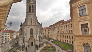 A historic church with a tall tower and a central entrance. - Apartment for Friends (Prague)