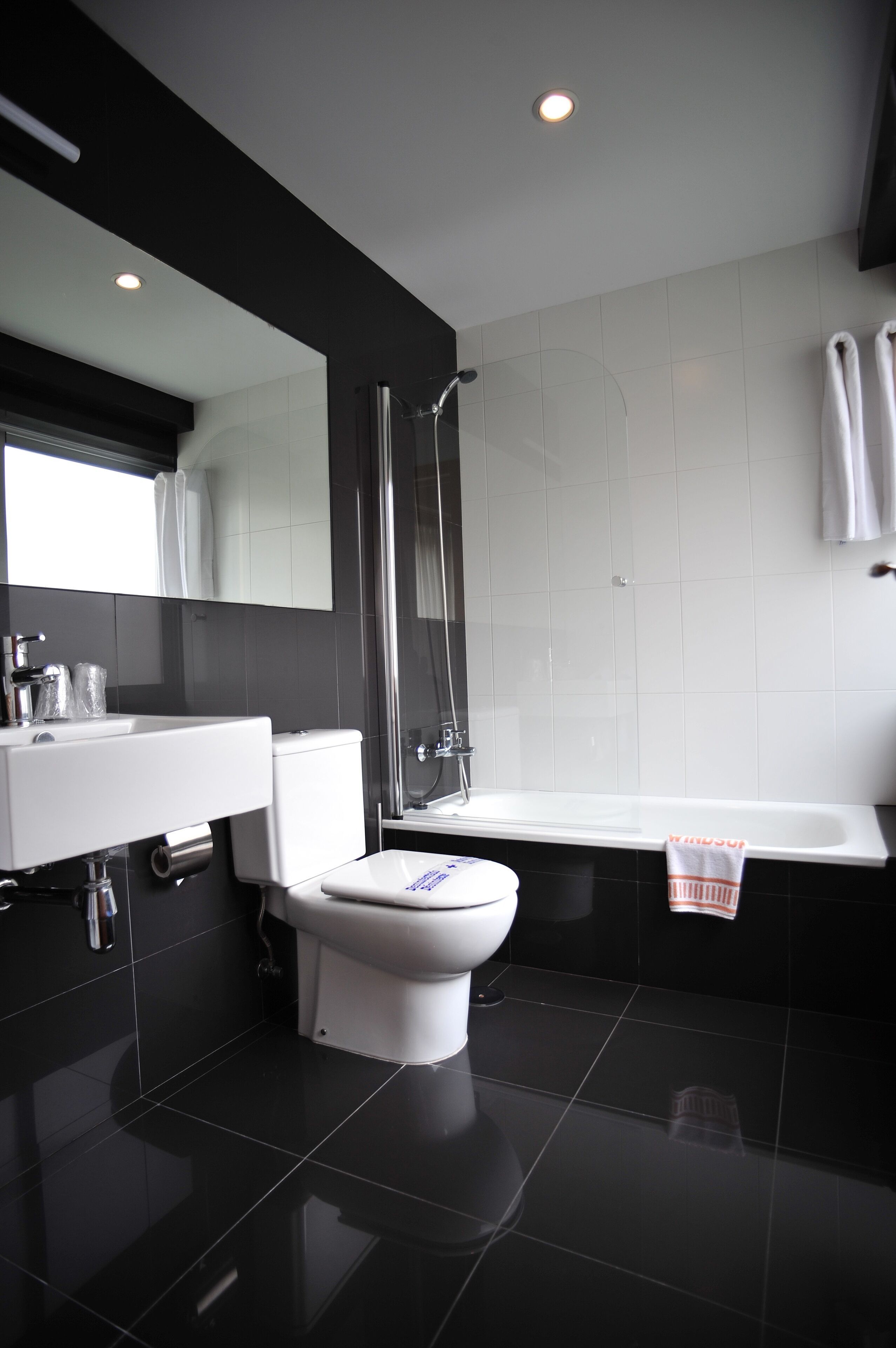 deep-soaking bathtub, free toiletries, hair dryer, towels