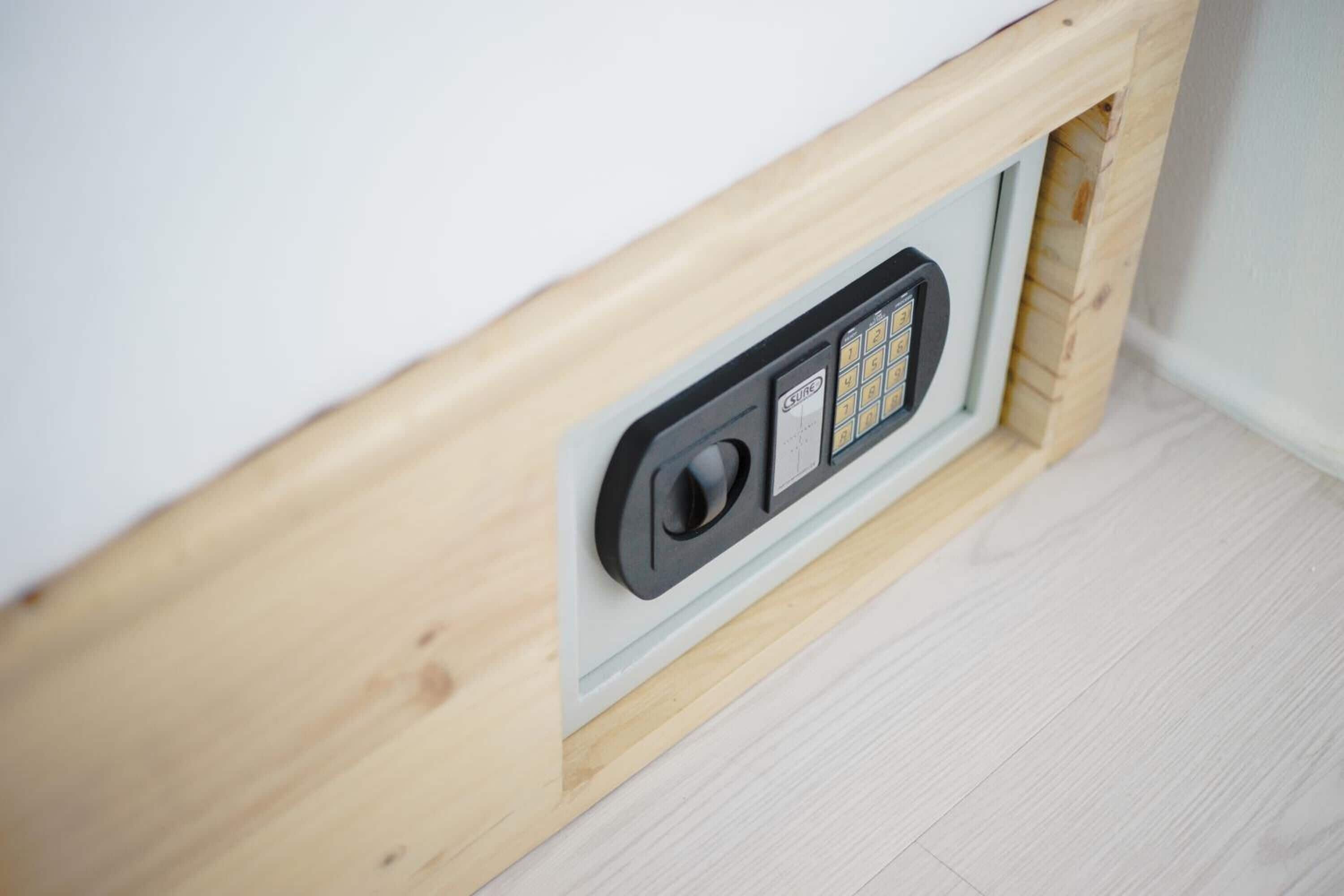 A wooden-framed wall with a built-in electrical outlet and switch panel.